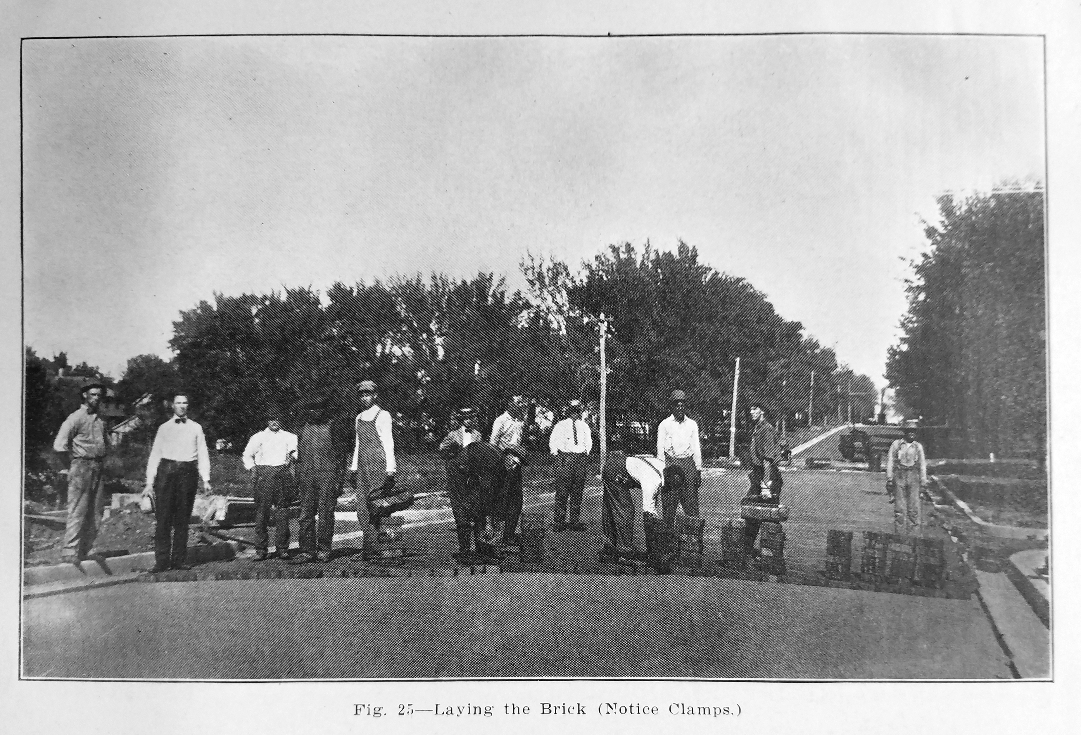 Crew of white and black brick setters. Source: Clarke Mandigo, A Text Book on Brick Pavements (Kansas City, Missouri: Western Paving Brick Manufacturers Association, 1917), 63.